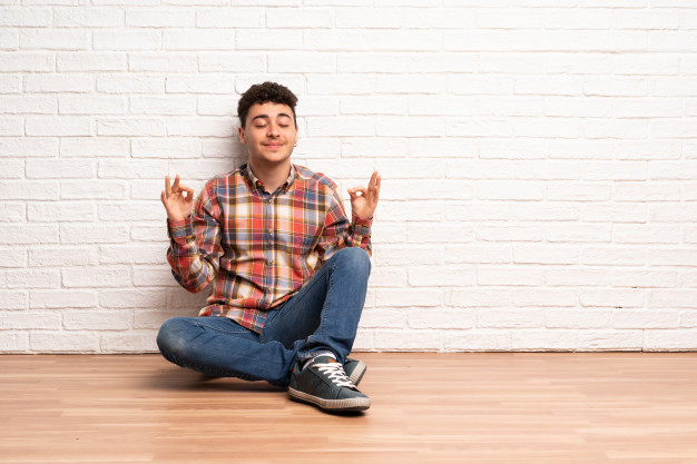 boy sitting on floor - casual boy poses